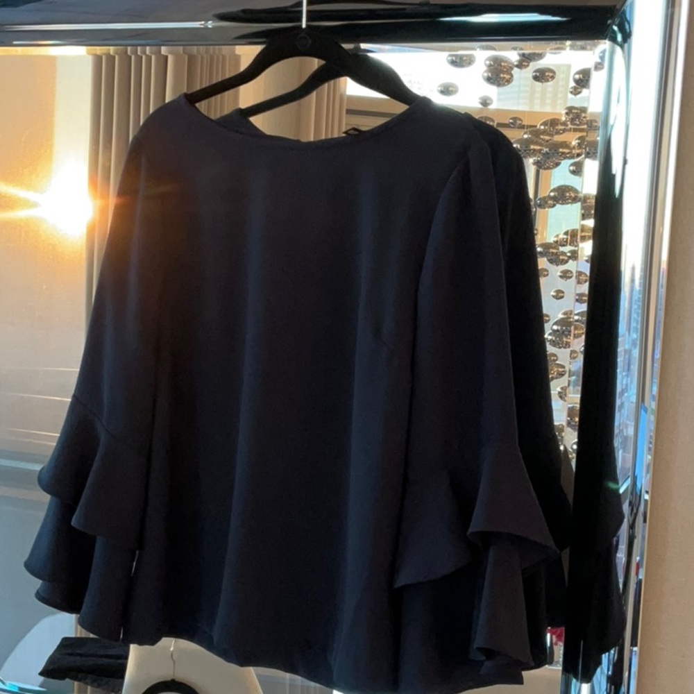 J Crew classic top with flutter sleeve.